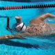 Watch Olympian Katie Ledecky swim with a full glass of milk on her head, without spilling a drop…