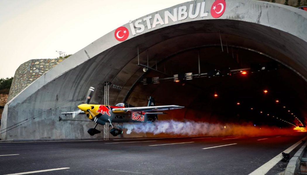 Watch a plane fly through a tunnel — and set a Guinness World Record at the same time…