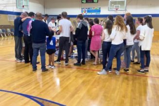 Catholic school kids break out singing the Regina Caeli in gym after first home game victory…