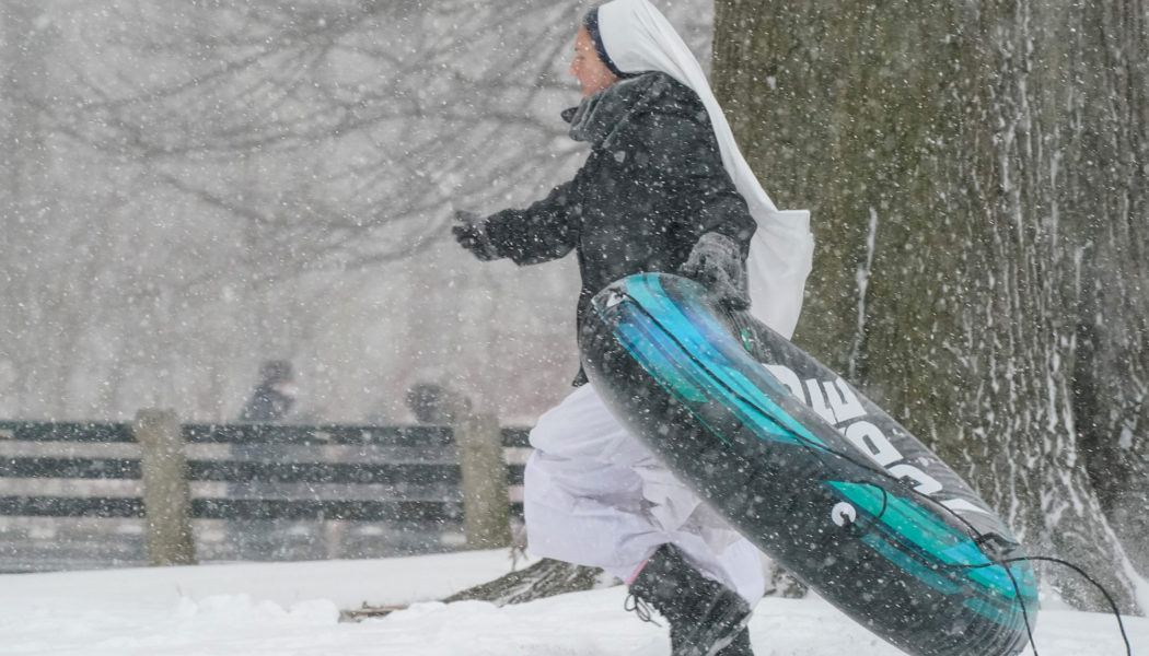Sisters of Life go sledding in Central Park as Winter Storm Kenan blankets New York City…
