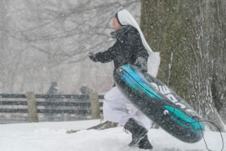 Sisters of Life go sledding in Central Park as Winter Storm Kenan blankets New York City…